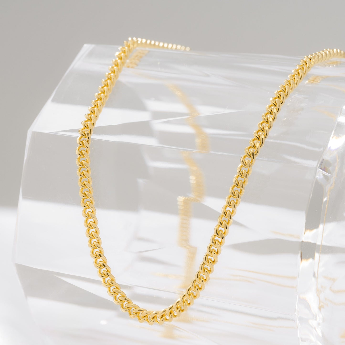 Cadena Cubana Plana 2.5 mm 65 Cms + Dije San Benito