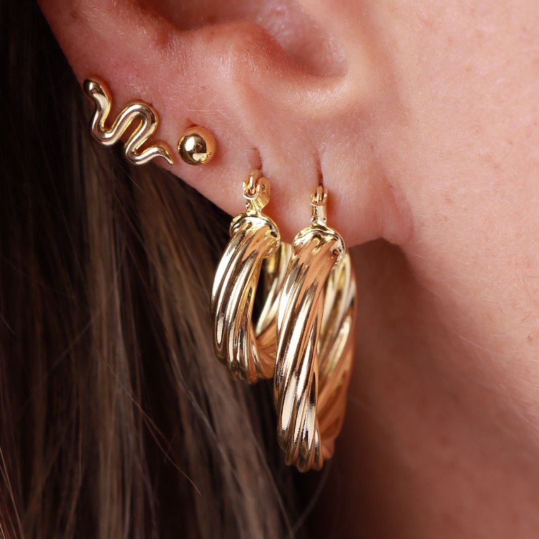 ARETES, TOPOS Y CANDONGAS